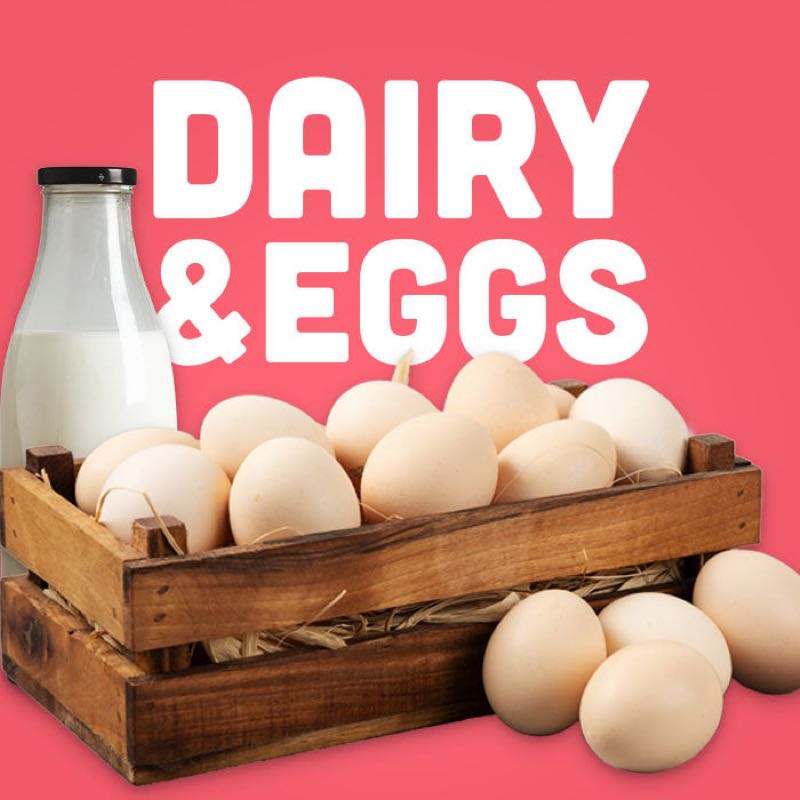 Fresh local milk and farm eggs in a wooden crate
